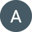 A gray circle with a white, uppercase letter "A" centered inside, designed by Kyle Proctor.